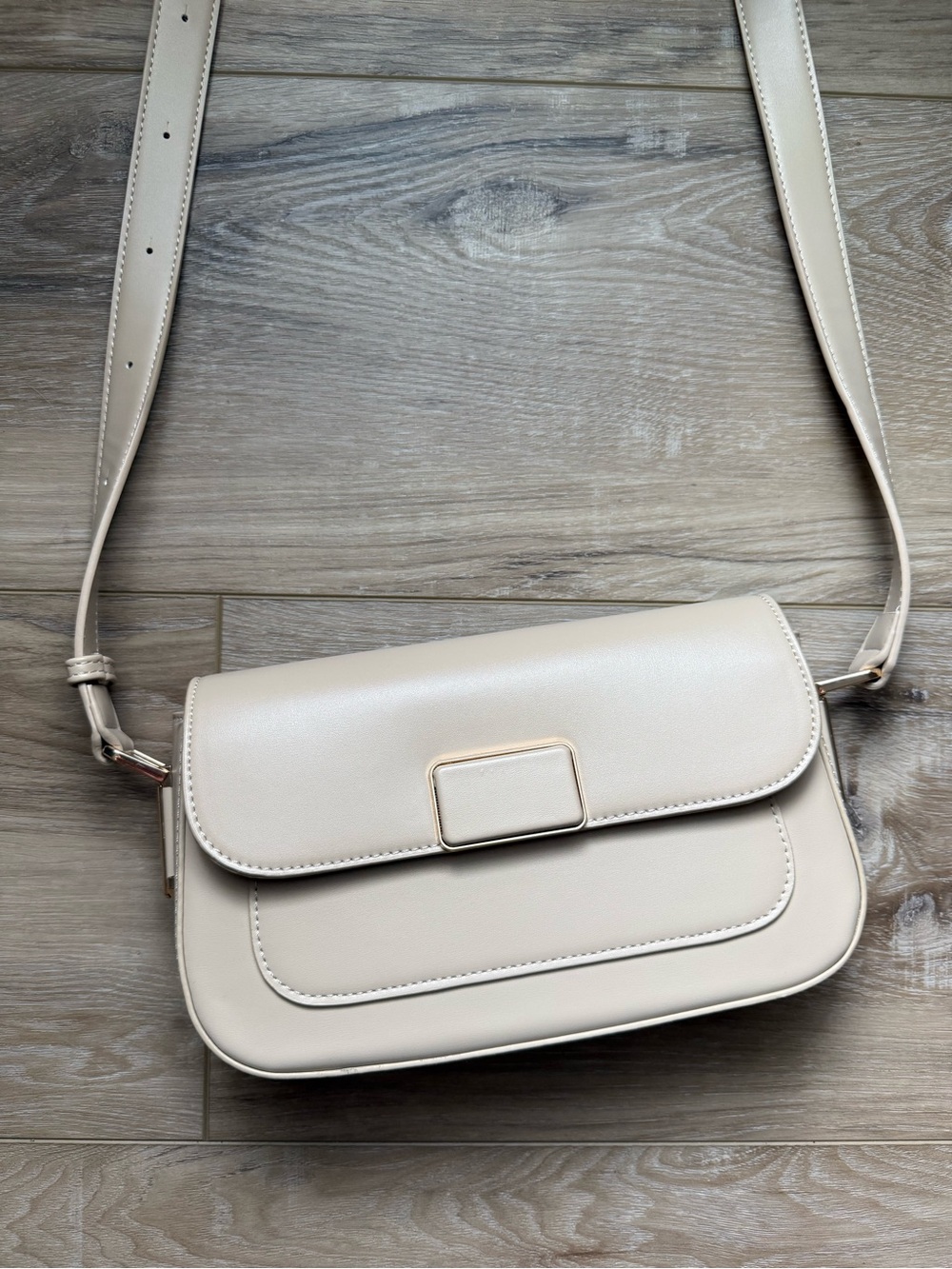 Madison West Cream Leather Crossbody with Gold Accent